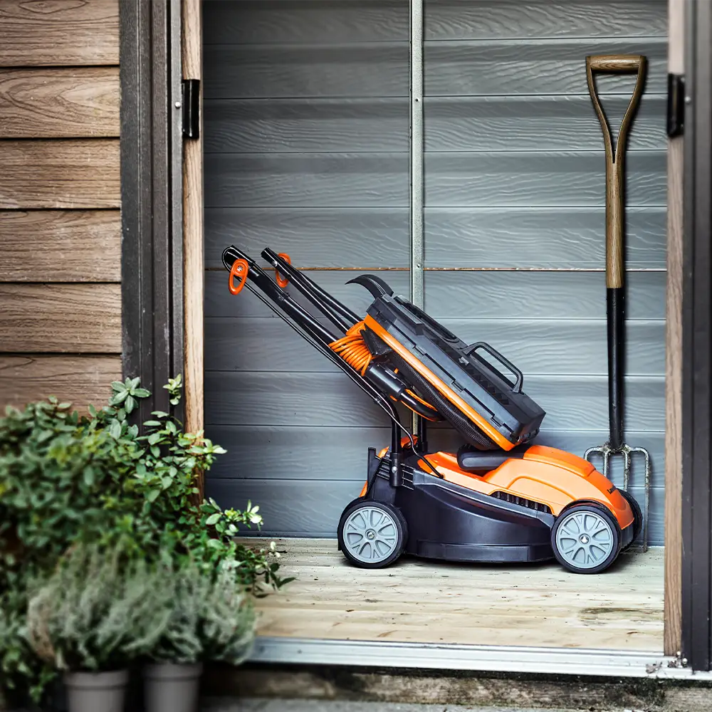 LawnMaster 32cm Electric Lawn Mower in Storage