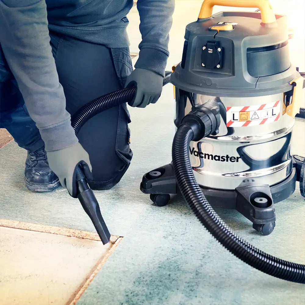 Vacmaster L20 Wet and Dry Vacuum cleaning a crevice on a UK building site