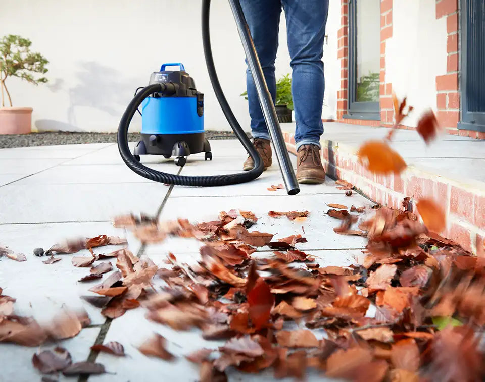 Outdoor wet and dry vacuum cleaner blowing leaves off patio Vacmaster