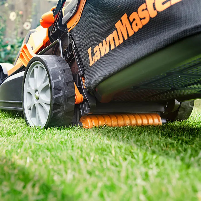 LawnMaster Cordless 34cm Lawn Mower in a UK Garden