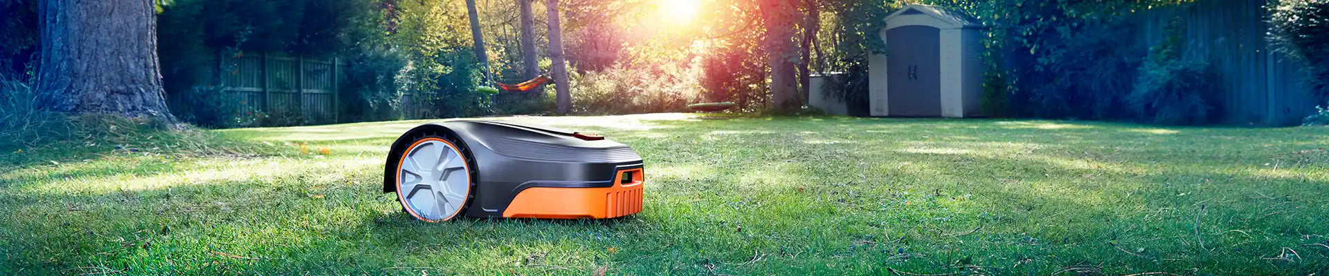 LawnMaster L10 Robot Lawn Mower on large lawn in UK