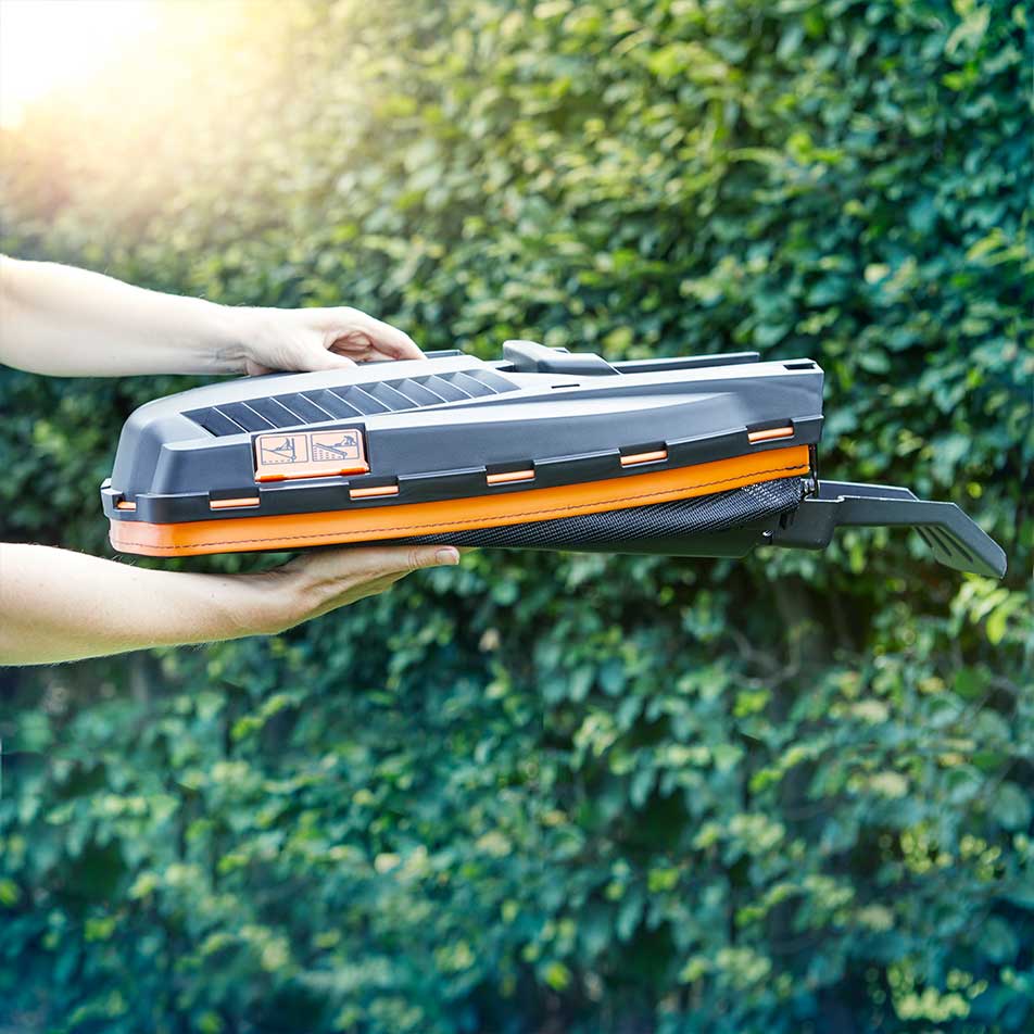 LawnMaster electric rotary lawnmower with grassbox collapsed for easy storage