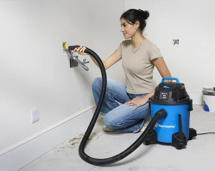Vacmaster vacuum cleaner cleaning dust and debris during home renovation Multi WD16
