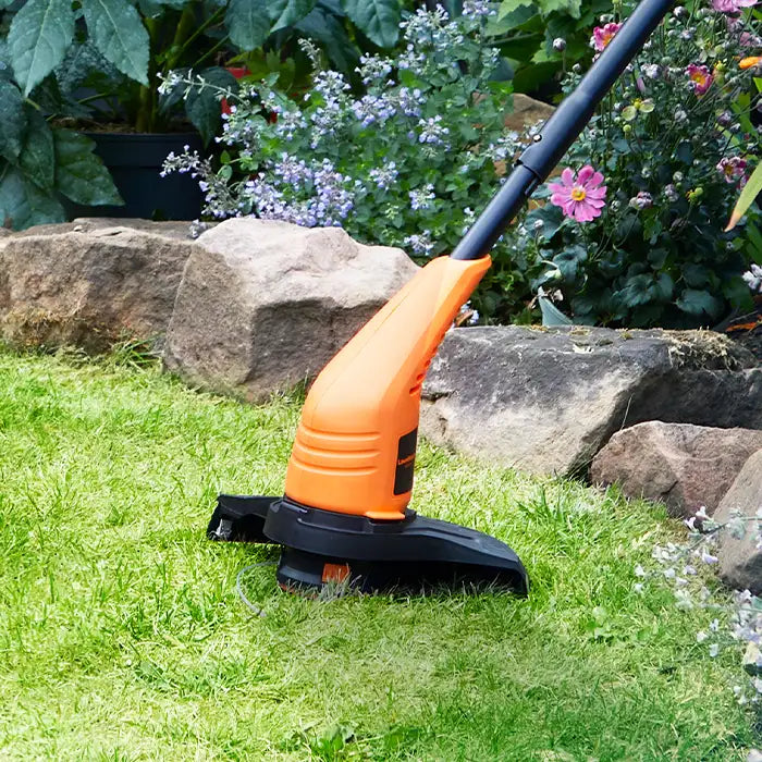 LawnMaster Electric Trimmer in a UK Garden