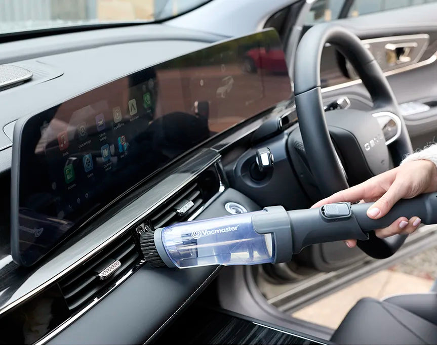 Vacmaster Spot Cleaner with dry vacuum brush attachment cleaning car vents and interior