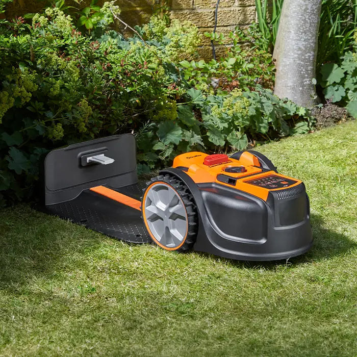 Robot Mower OcuMow AMB16-400 charging in a UK garden