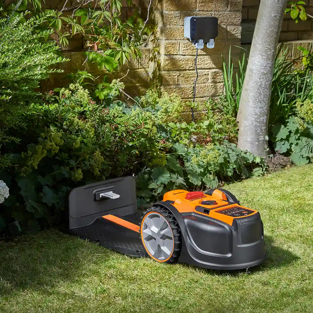 OcuMow AMB16-400 Charging in a Garden