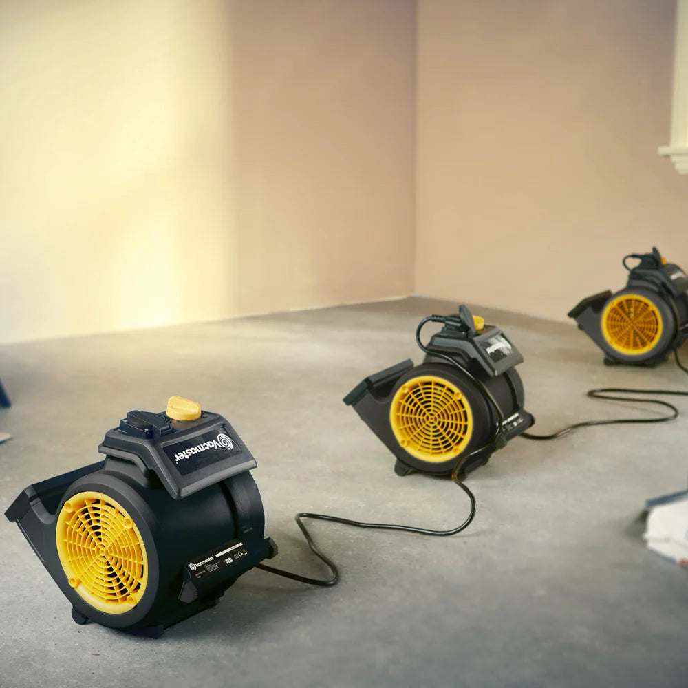 Multiple Vacmaster airmovers being used for commercial drying