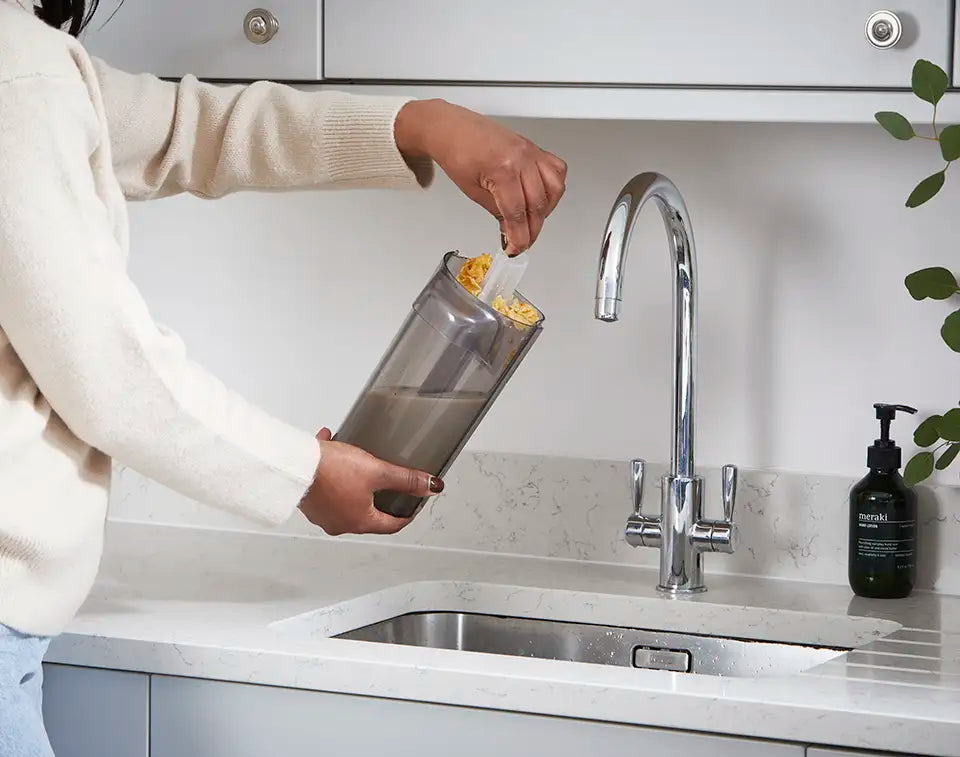 Hard Floor Cleaner Dirty Water Tank Being Emptied into Kitchen Sink - Vacmaster HVA
