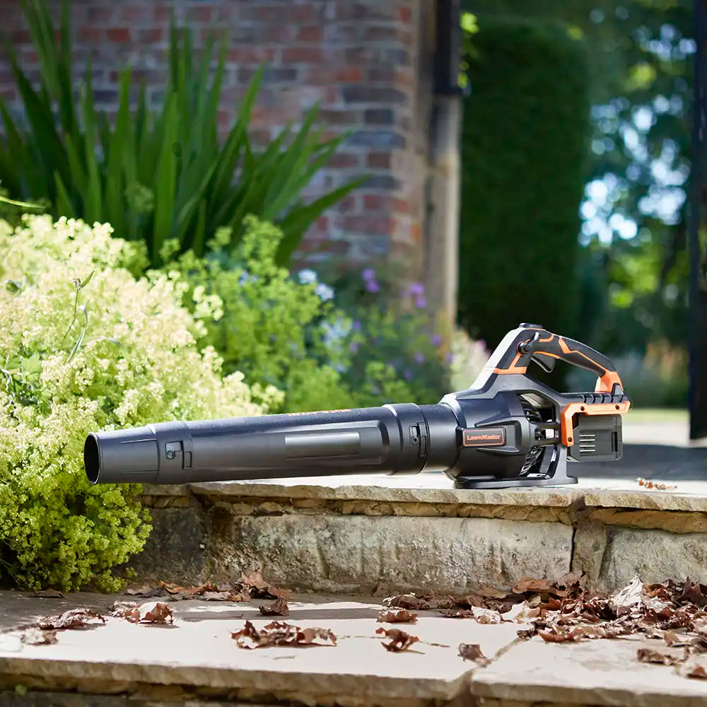 Leaf Blower cordless 48V from LawnMaster on garden path