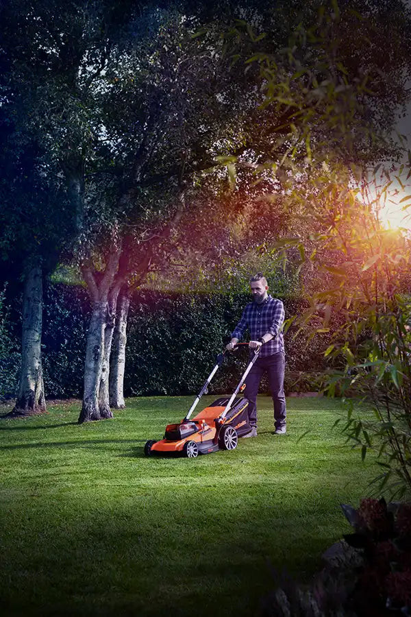 LawnMaster Cordless Lawnmower on large UK garden
