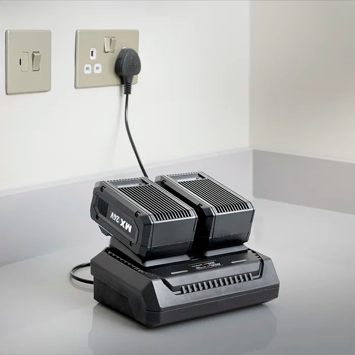 LawnMaster Cordless Mower Dual Port Battery Charger in kitchen bench