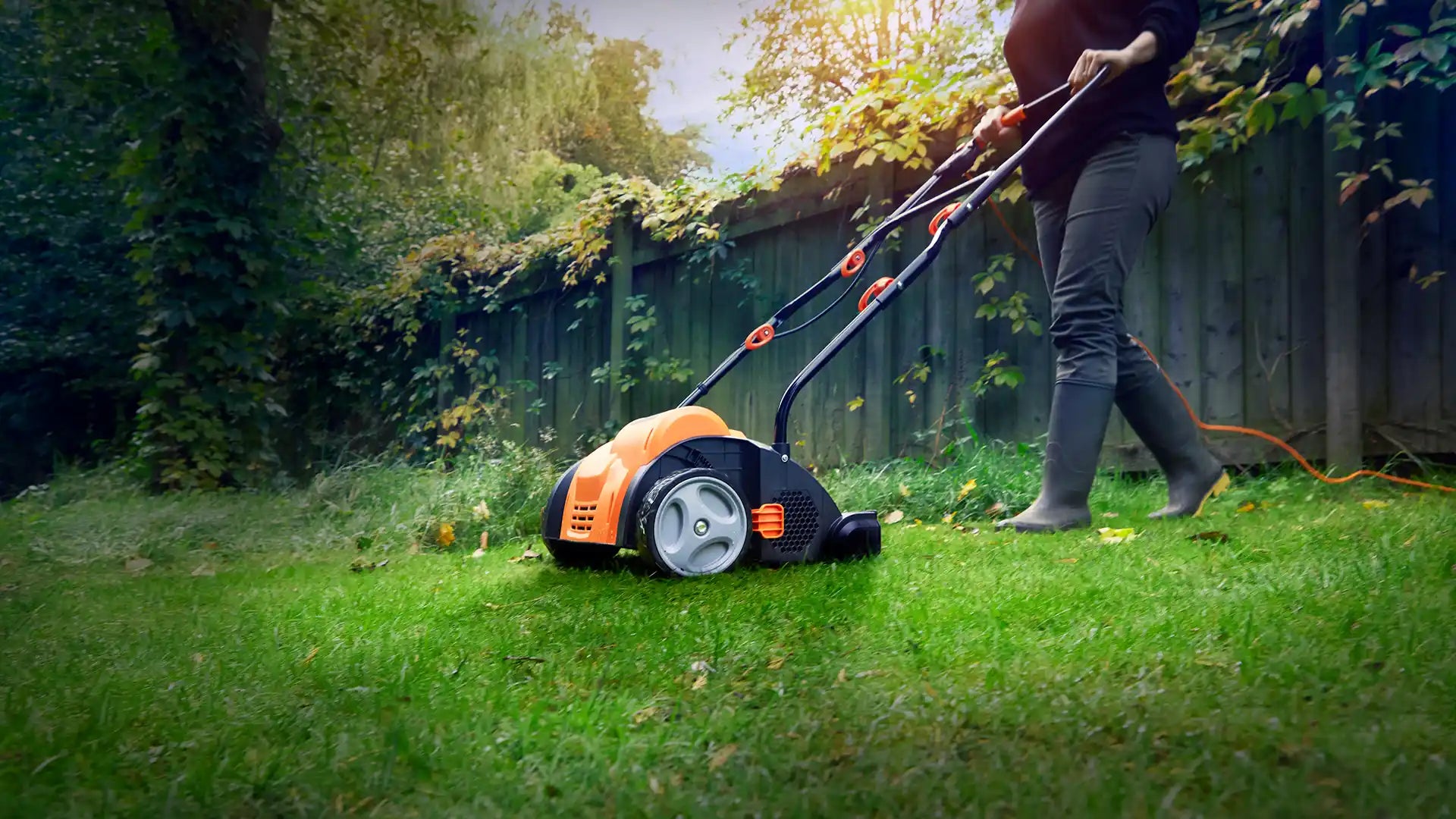 LawnMaster Scarifier removing tatch and moss from UK lawn