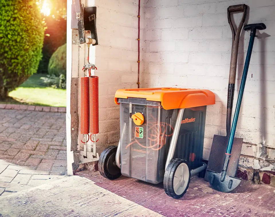 LawnMaster Quiet Shredder with Compact Storage in a UK Garage