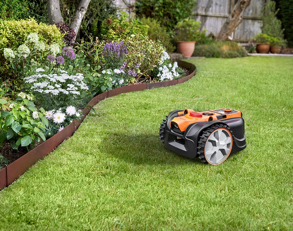 Lawnmaster OcuMow AMB16-600 on lawn with 2 year guarantee