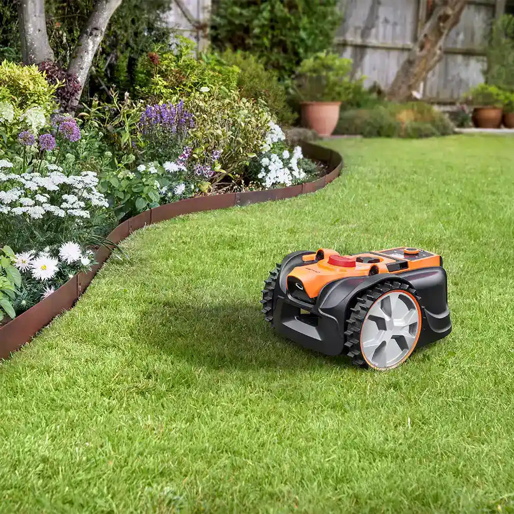 Lawnmaster Robow Mower on garden lawn with defined borders