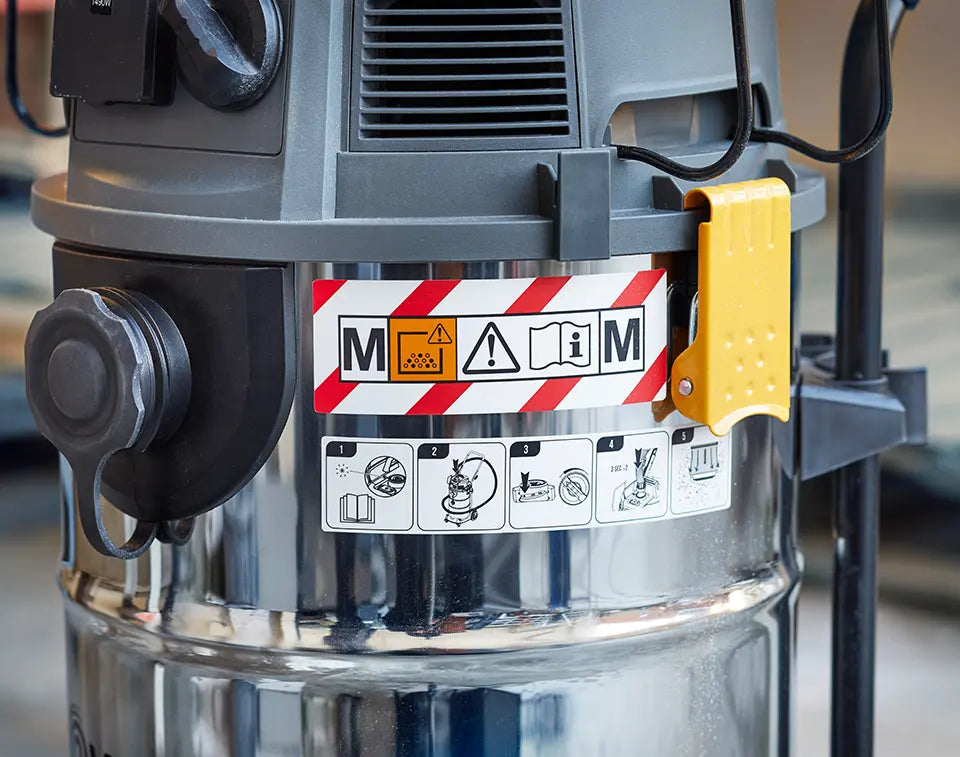 M Class Dust Extractor regulation label close-up