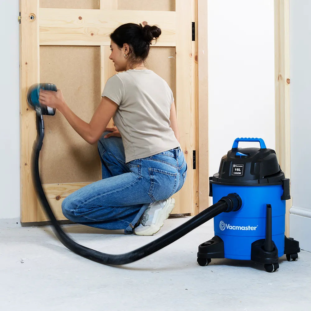 Vacmaster 16L wet and dry vacuum attached to power tool for dust extraction while sanding