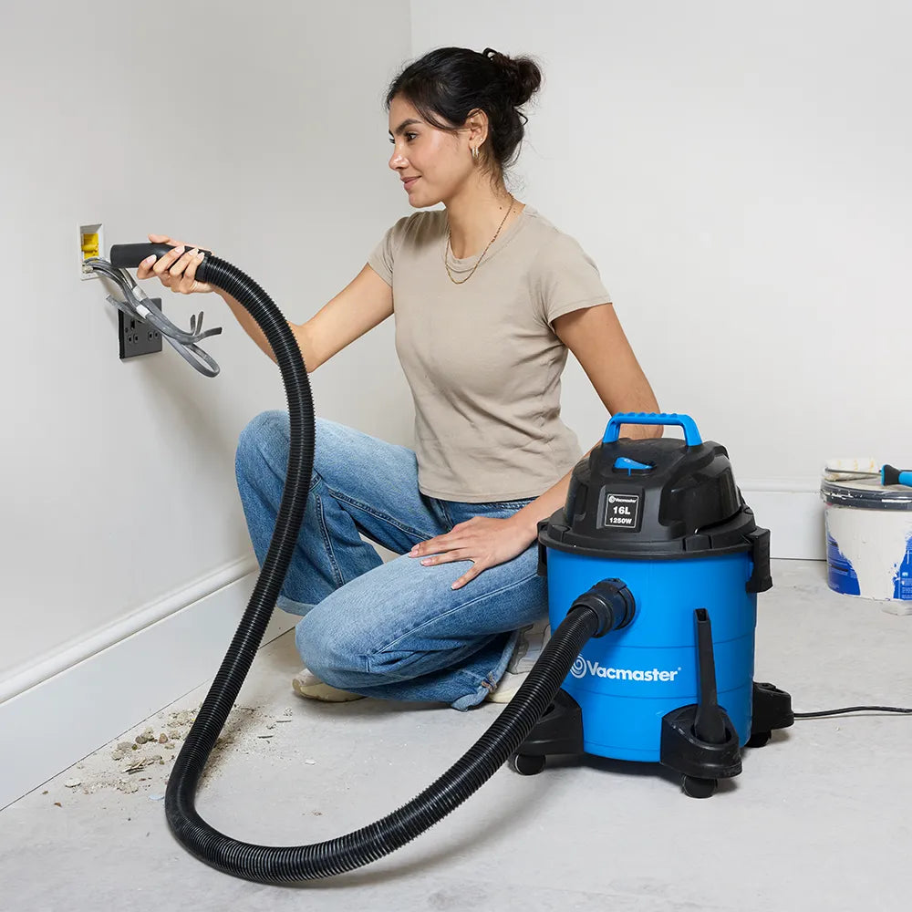 Vacmaster 16L wet and dry vacuum cleaner being used for indoor renovation cleanup