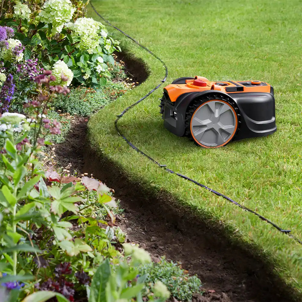 Robot Lawnmower avoiding no-go strip around flower beds in garden