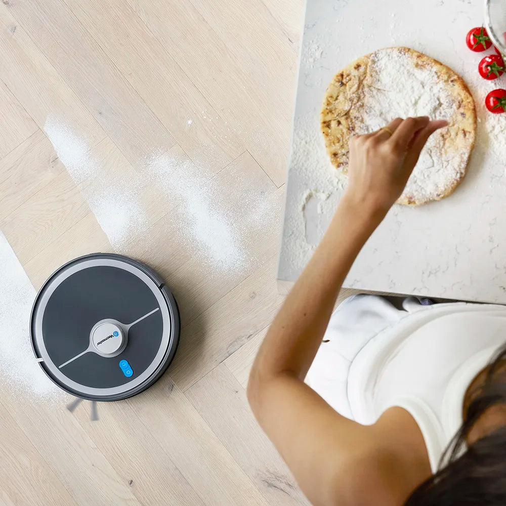 Vacmaster REi Robot Vacuum Cleaner  vacuumin flour off floor with powerful suction in kitchen 