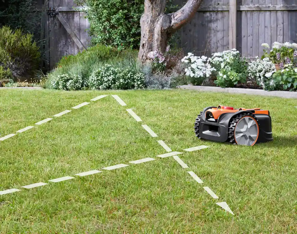 Robot lawnmower showing random mowing pattern on lawn