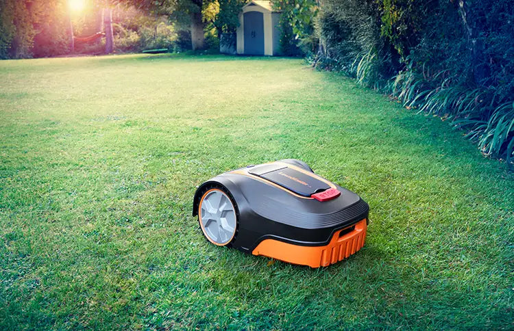 LawnMaster L12 Robot Lawn Mower on large lawn in UK