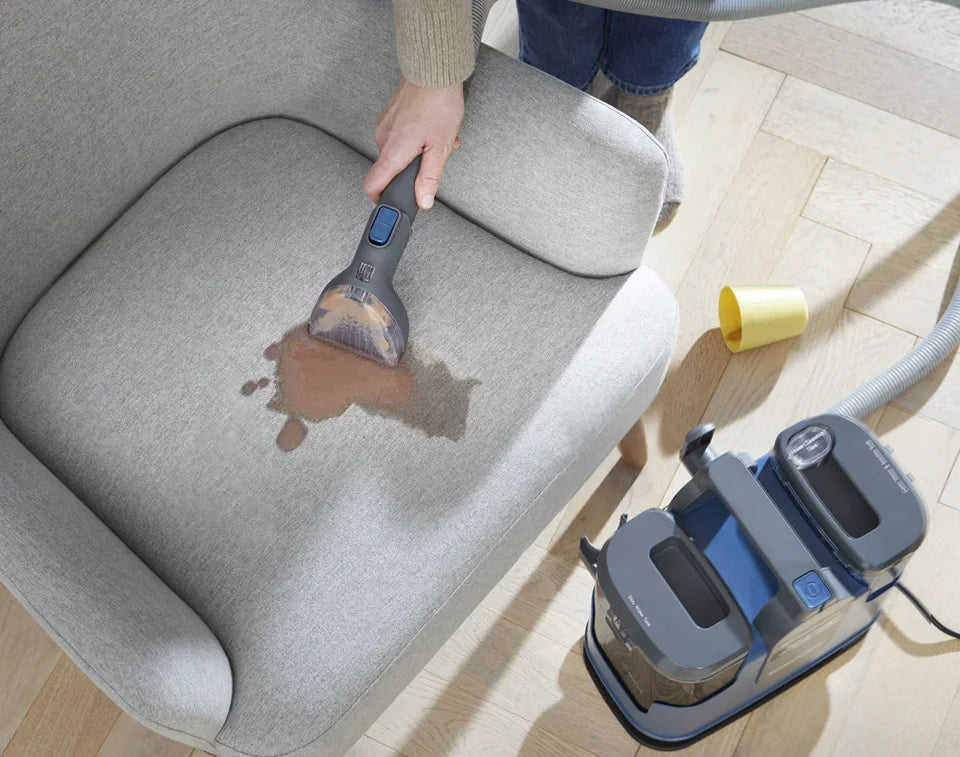 EasyClean Thermo heated spot cleaner cleaning split milk shake from a chair