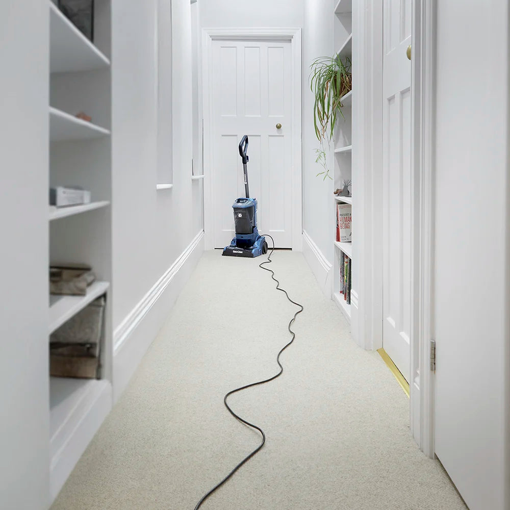 Long Reach Cable Vacmaster UCT Carpet Cleaner a
at the End of a Long Hallway in a Home