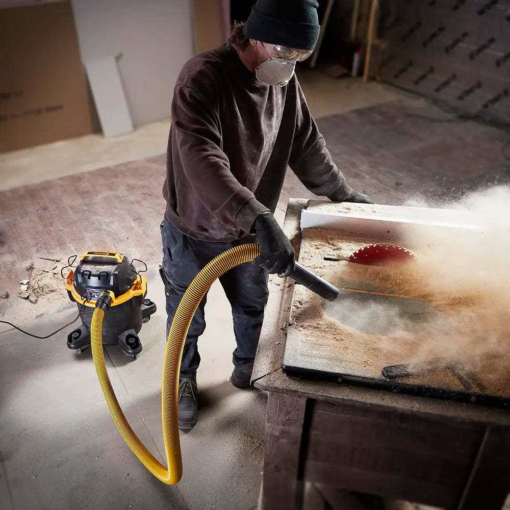 Vacmaster Blower Function Clearing Sawdust from Workbench