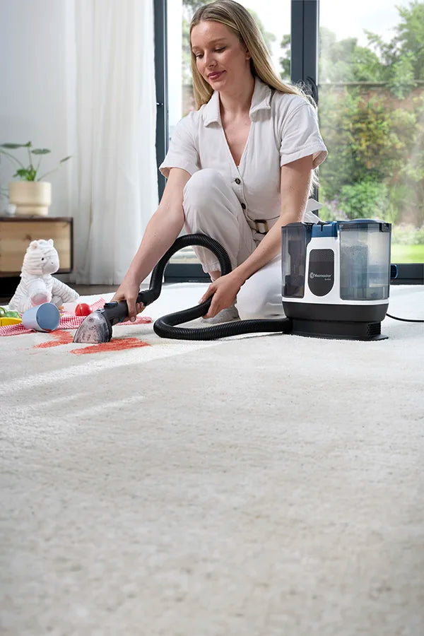 Vacmaster Spotlet Carpet Spot Cleaner cleaning spilled juice stain from rug mob