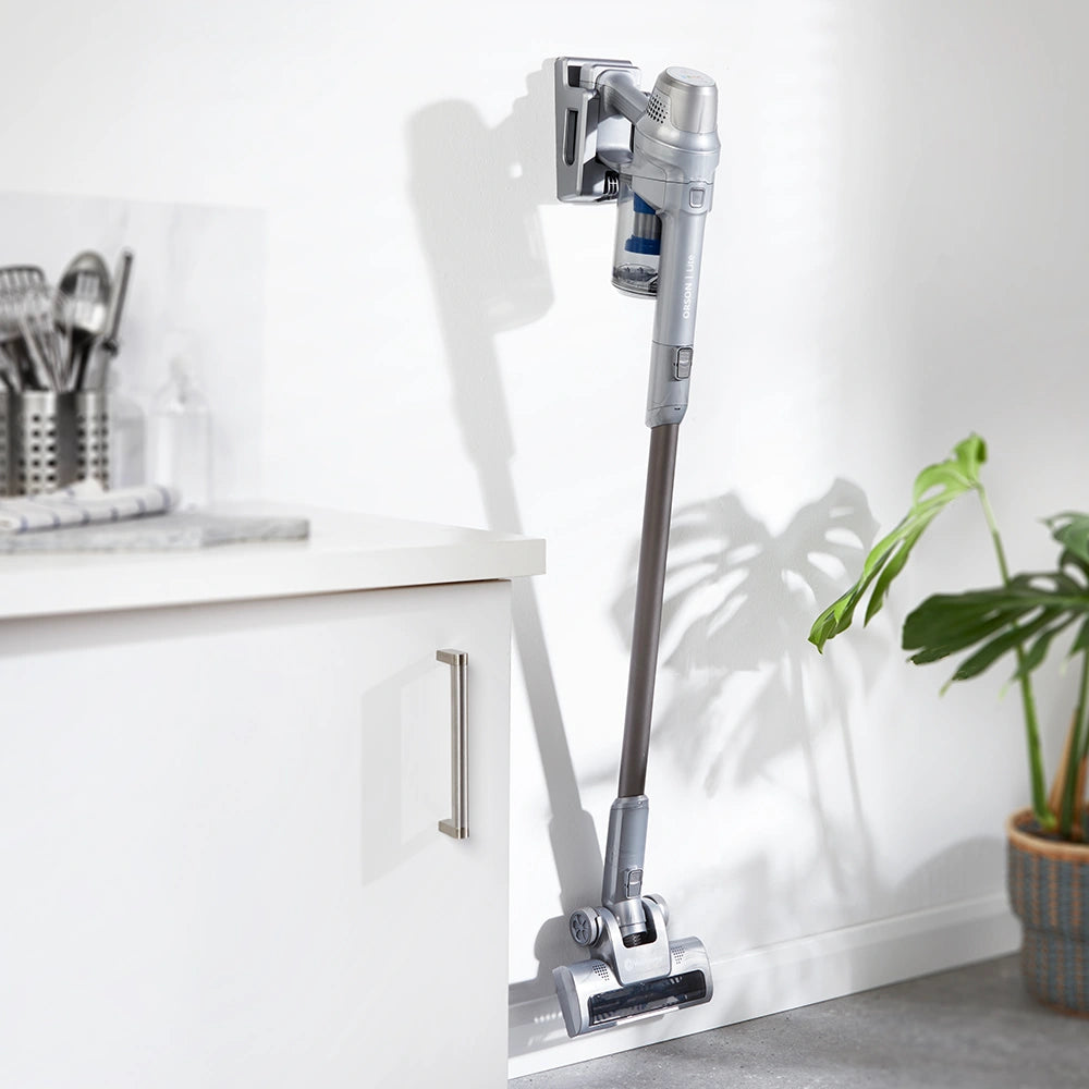 Vacmaster Orson Lite 24V Cordless Upright Vacuum hung on the wall in a UK home