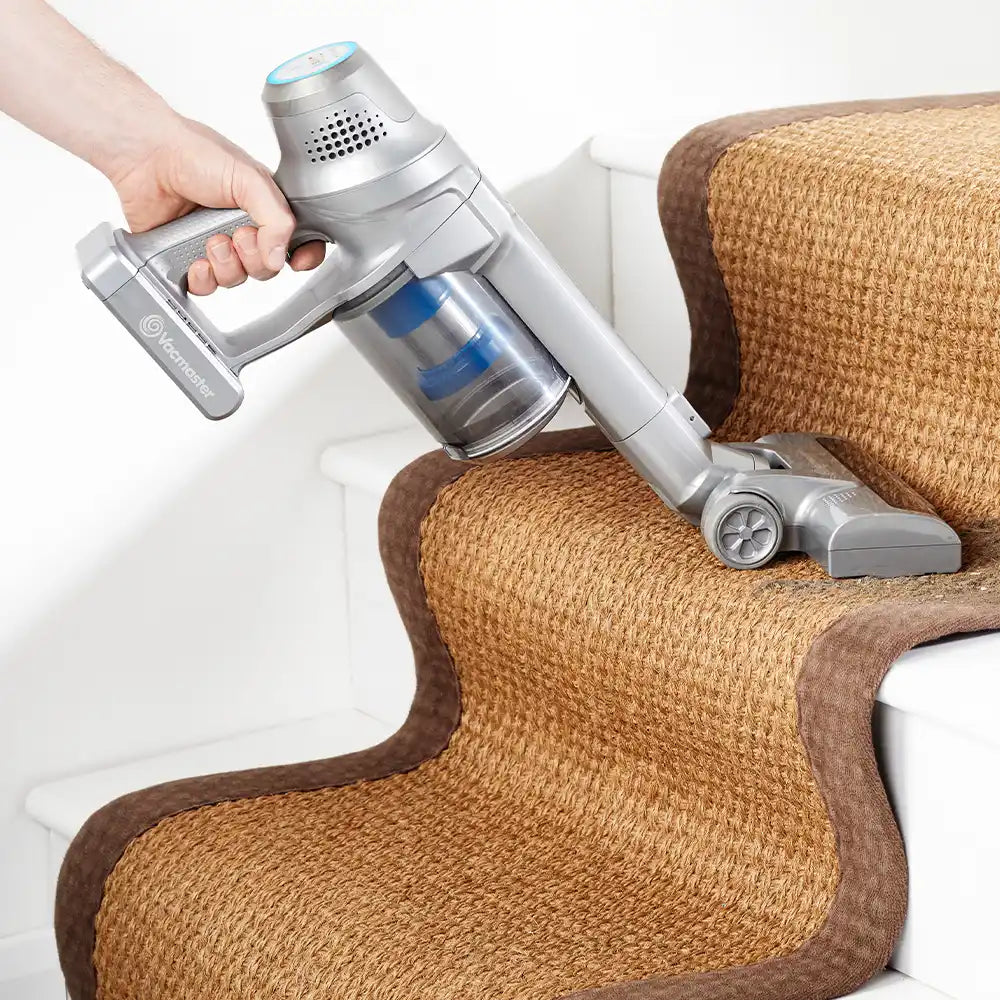 Vacmaster Cordless Vacuum in use on stairs of UK home