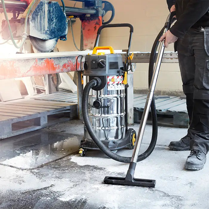 Wet and Dry Vacmaster M Class Dust Extractor Vacuuming Up Liquid