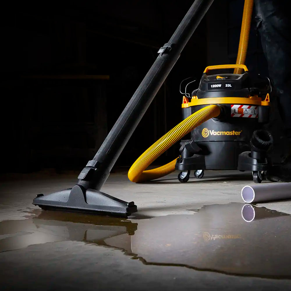 Vacmaster Wet & Dry vacuum cleaner extracting spilled water from building site