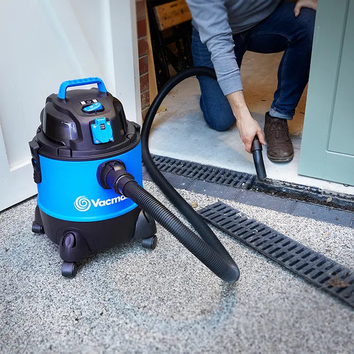Vacmaster Multi 20 with an Extra Long Hose, cleaning a gutter