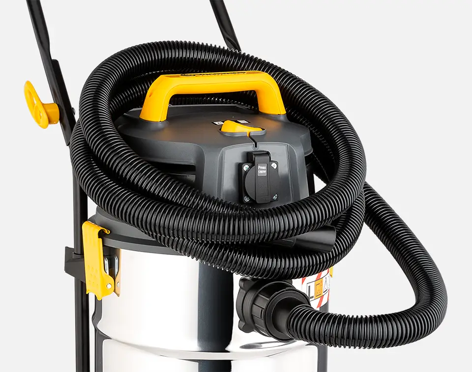 Vacmaster anti-crush vacuum cleaner suction hose wrapped around machine