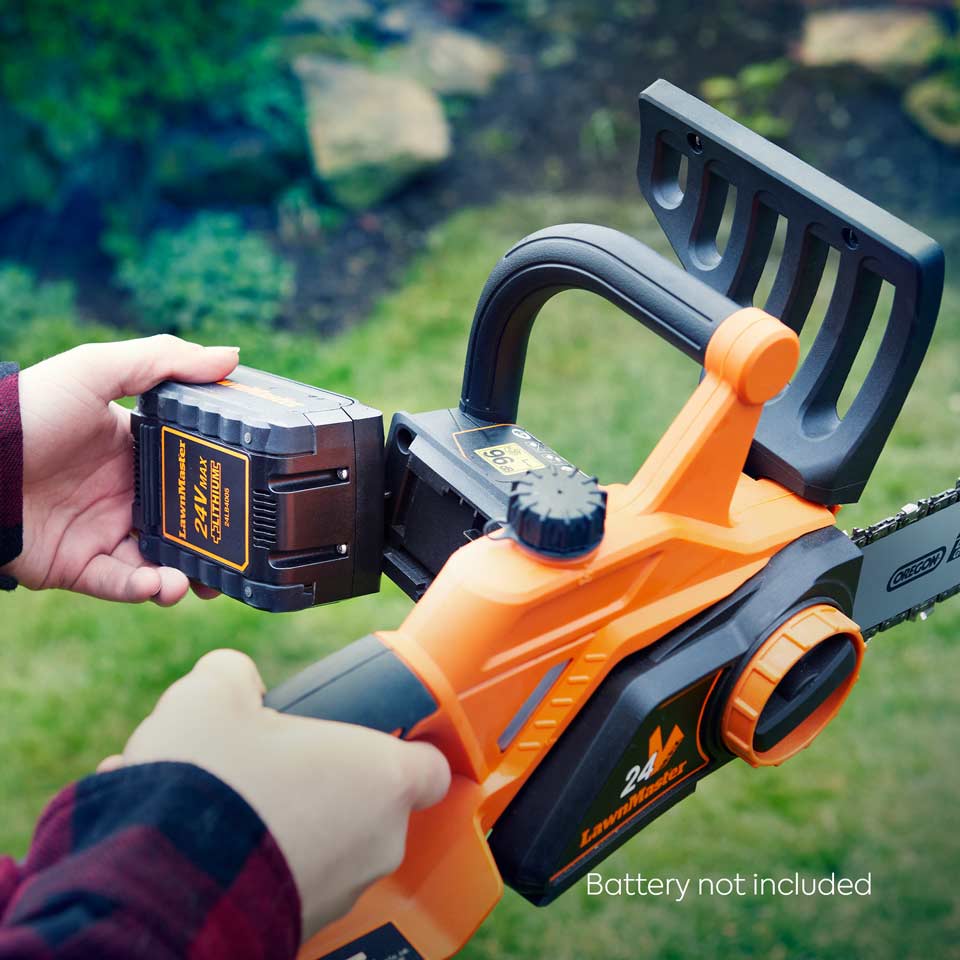 Cordless Chainsaw LawnMaster MX 24V Shared Battery System 4.0Ah Battery being fitted
