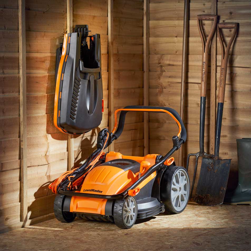 LawnMaster Electric Lawn mower Rotary 1800W 40cm MEB1840M folded away in shed