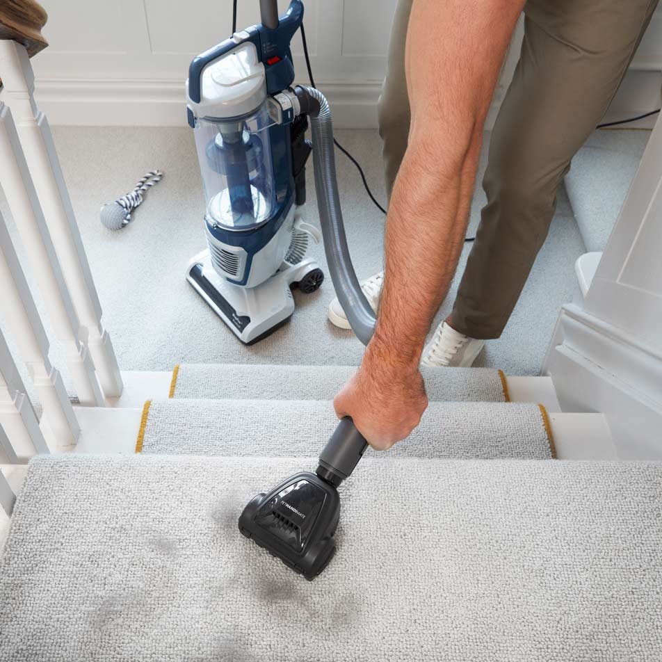 Upright vacuum cleaner the Vacmaster Respira with Pet Mate Tool on Stairs