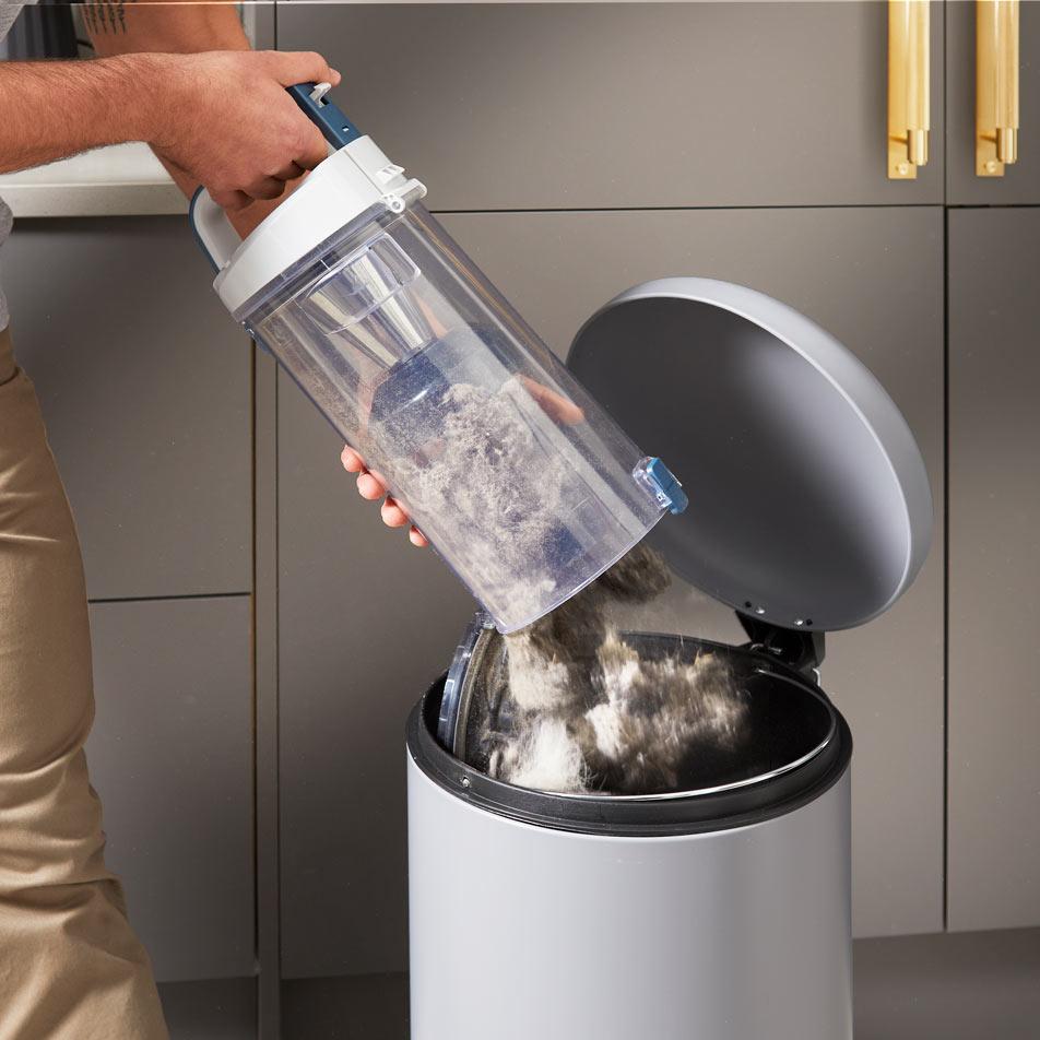 Vacmaster Respira Cyclonic vacuum being emptied